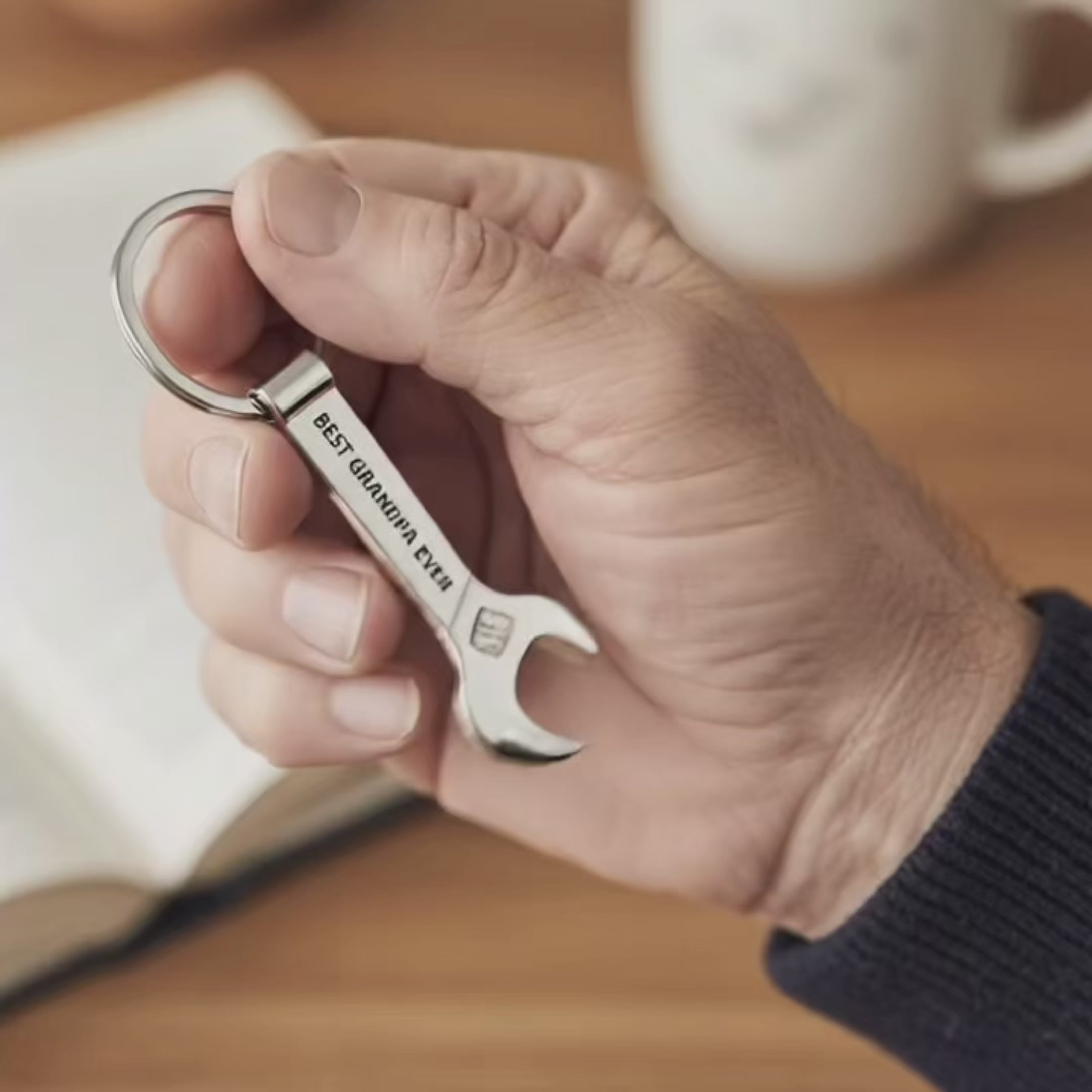 Video showing custom engraved wrench keychain in silver and gold; personalized tool keychain for mechanics, CHristmas and Father’s Day gifts.
