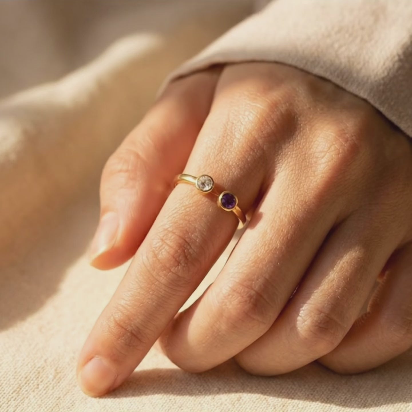 Video showcasing a dainty adjustable birthstone ring with two natural gemstones, elegant stacking ring for everyday wear and personalized jewelry styling