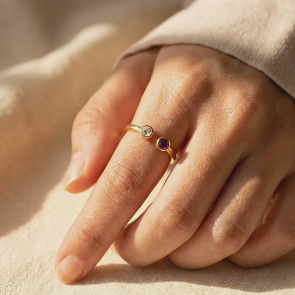 Video showcasing a dainty adjustable birthstone ring with two natural gemstones, elegant stacking ring for everyday wear and personalized jewelry styling