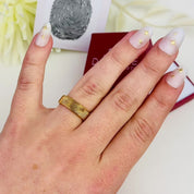 A video showing an engraved 6mm fingerprint ring, personalized gold, silver, rose gold memorial ring, memorial actual fingerprint ring, personalized 18k vermeil gold ring, subtle memorial ring for man, personalized men's memorial band, custom wedding band with spouse's fingerprint