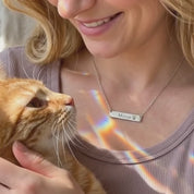 Video of Multiple paw print bar necklaces in a variety of fonts. Pet memorial bar necklace, engraved pet jewelry, custom pet name necklace, sterling silver bar necklace, gold-filled pet necklace, rose gold-filled necklace, personalized pet remembrance gift, dog mom gift, pet owner jewelry, pet tribute necklace, engraved pet charm