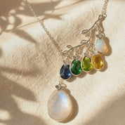 A video showcasing family tree birthstone necklace for mom gold branch necklace with multiple gemstones