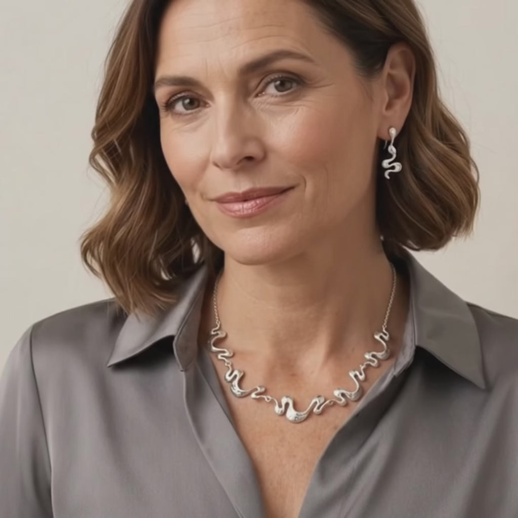 video showcasing gold boho wave necklace with matching earrings styled as modern statement jewelry