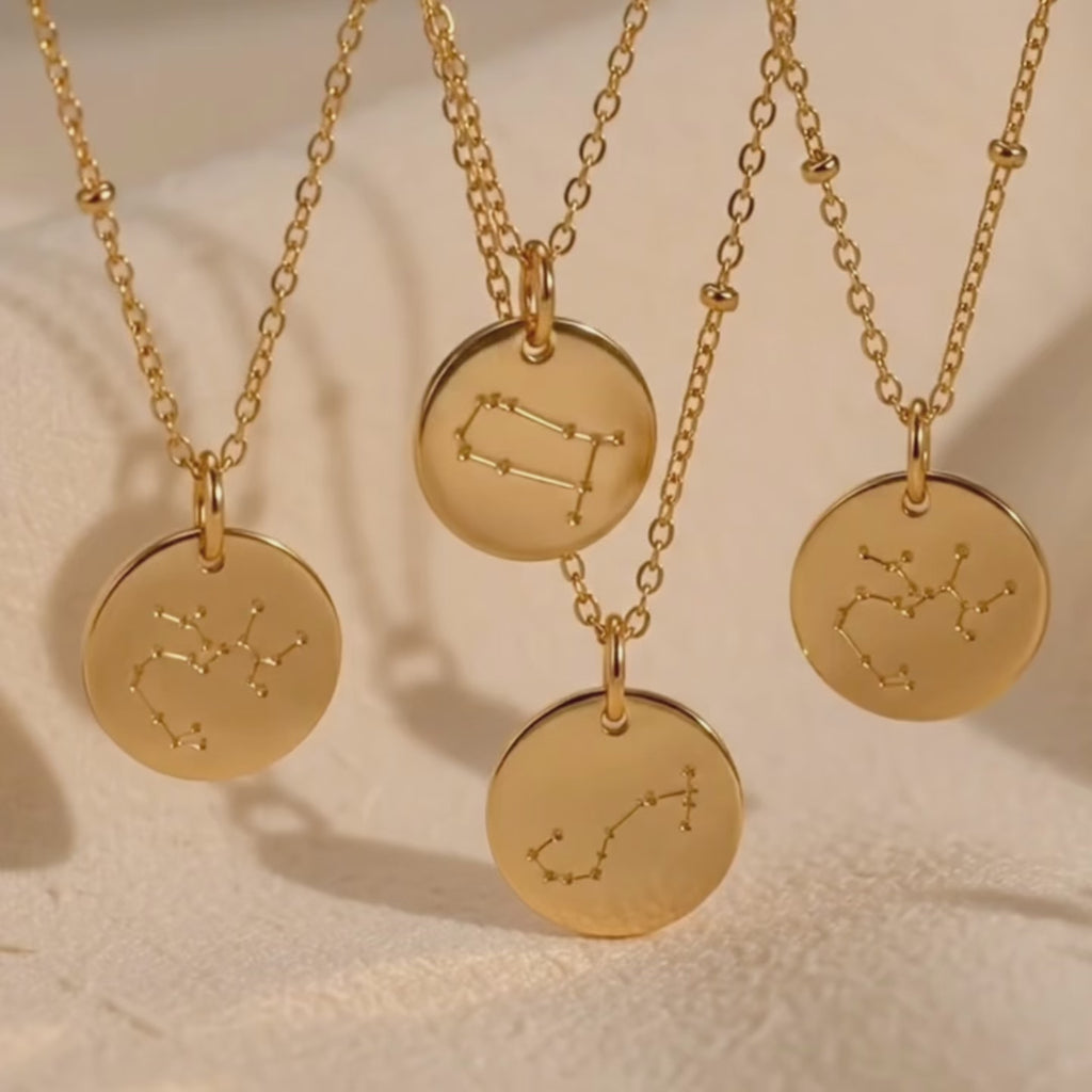 video showcasing a Personalized zodiac constellation disc necklaces. Comes in 14 Rose gold-filled, sterling silver
