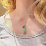 Video showing a custom birthstone lariat necklace for mom in sterling silver or gold filled—a delicate Y-neck chain with bezel-set teardrop birthstones representing children, adjustable length, minimalist and personalized. A meaningful Mother’s Day or birthday gift, handmade in the USA and gift-ready.
