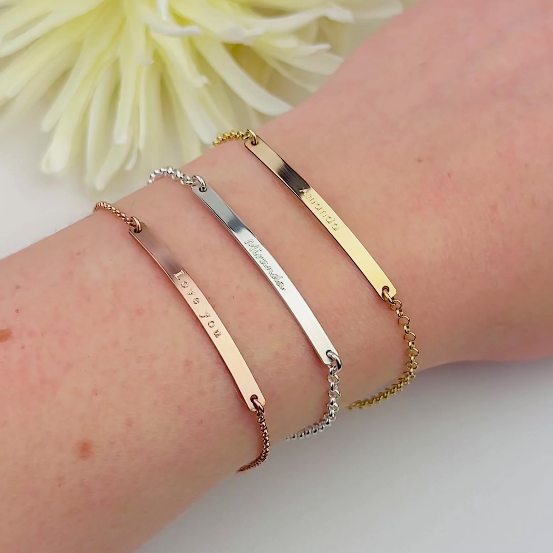 A video showing personalized skinny bar engraved bracelets, personalized plate bracelets, custom bar bracelet, name bracelet, personalized emergency bracelet, custom emergency medical bracelet, engraved sterling silver, rose gold filled, gold filled engraved jewelry for him, her, child