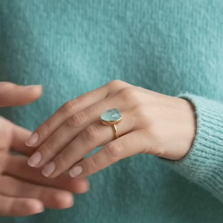Video showcasing roung cut Moonstone, Labradorite, and Aqua Chalcedony ring