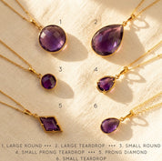 Gold amethyst jewelry set with matching necklace earrings and rings, purple gemstone collection, elegant gift-ready jewelry