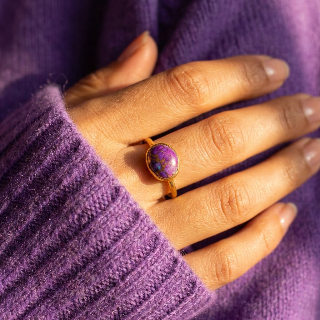 Purple Mohave turquoise cabochon ring in oval bezel setting worn on hand, bold statement gemstone ring in 24K yellow gold vermeil, natural mohave copper turquoise ring for women