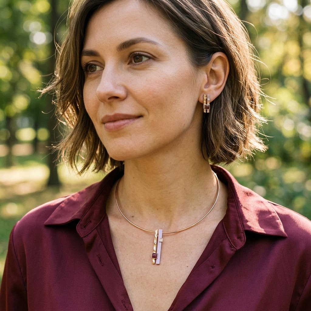 Woman wearing Lavender and Burgundy geometric pendant necklace with rose gold details

