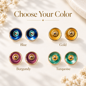 Turquoise abstract flower stud earrings with matching station necklace displayed on light background