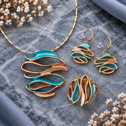 Ocean Breeze Sculptural Wave statement ring with teal and warm metallic flowing design

