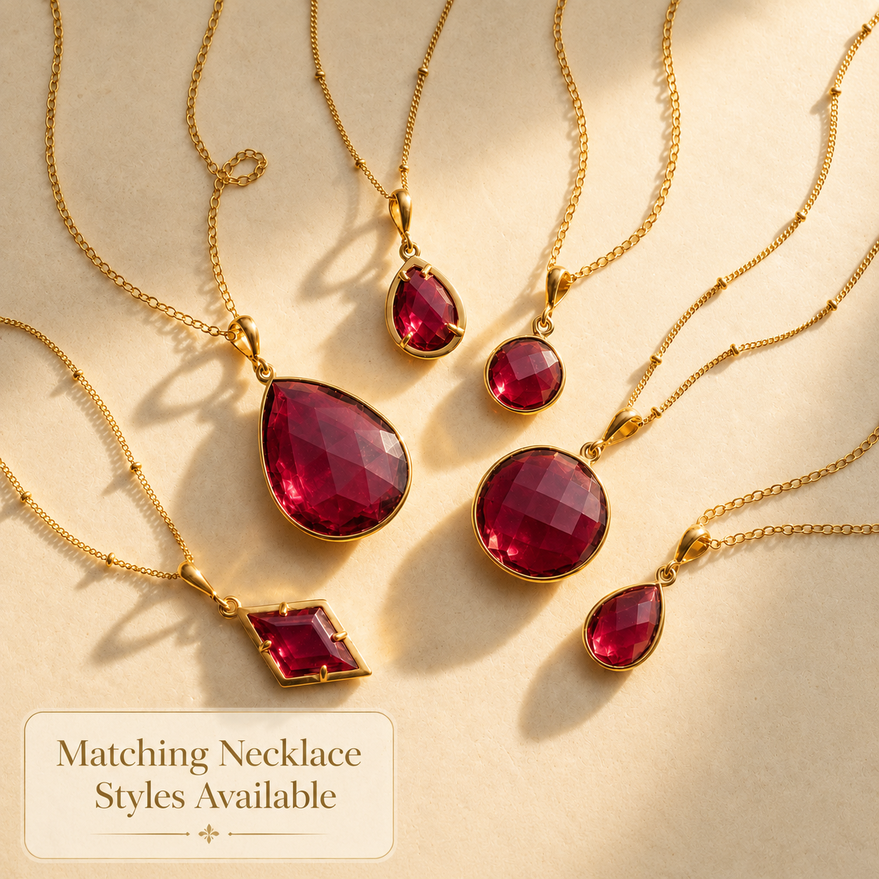 Ruby quartz earrings and matching necklace styles shown together as a coordinated July birthstone jewelry set.