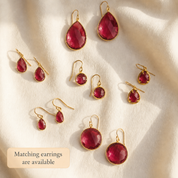 Ruby quartz matching earrings and necklace set shown as coordinating July birthstone jewelry.