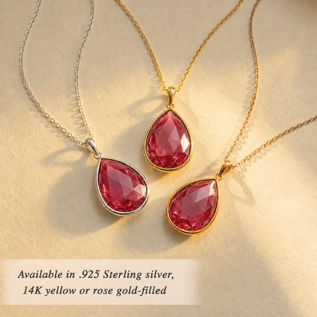 Ruby quartz necklaces shown in sterling silver, yellow gold, and rose gold finishes.