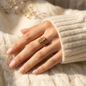 Model wearing clear quartz ring, meaningful April birthstone jewelry gift