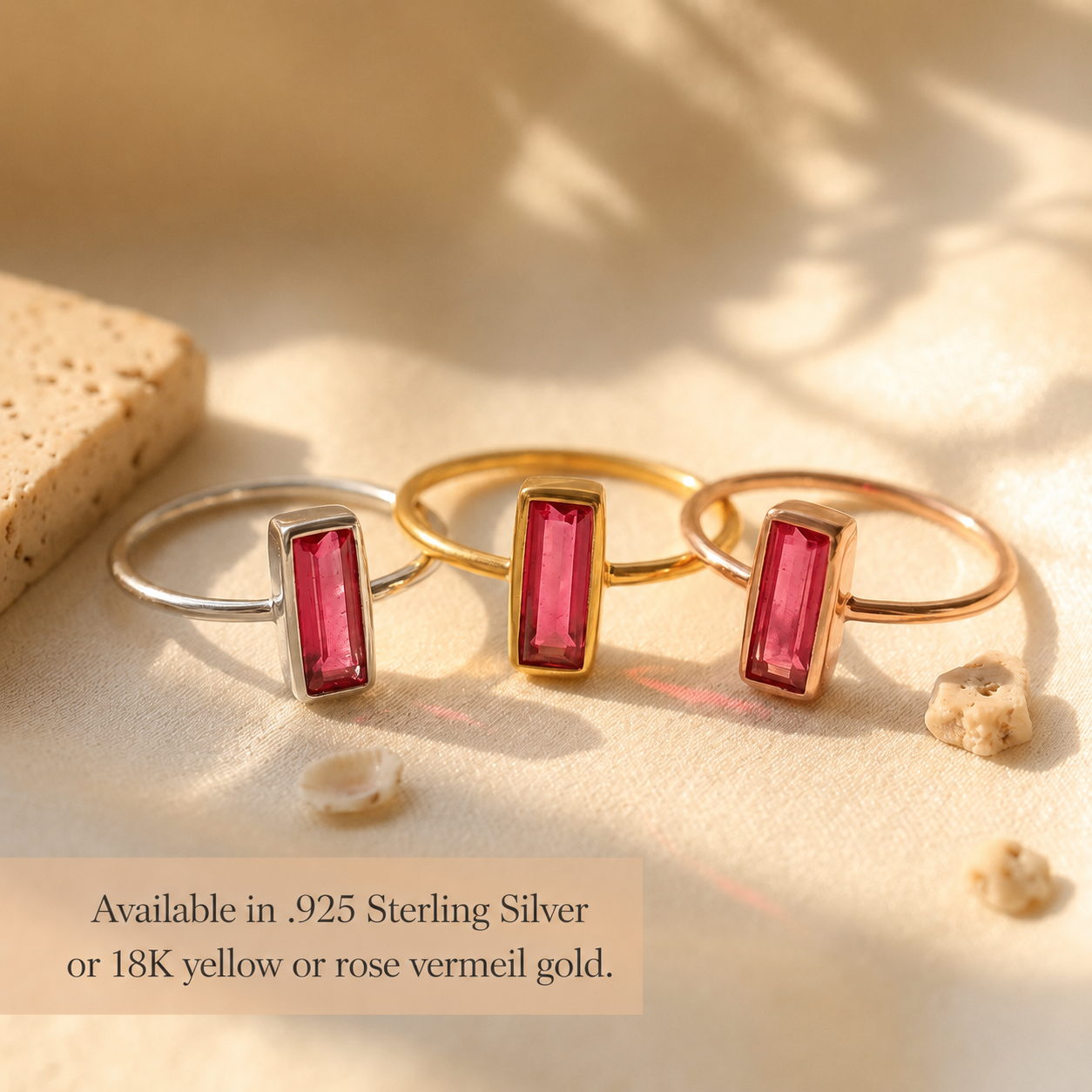 Tiny ruby baguette rings shown in sterling silver, yellow gold vermeil, and rose gold vermeil.