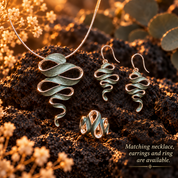 Ribbon Cascade matching necklace earrings and adjustable ring in Natural Sage on dark stone

