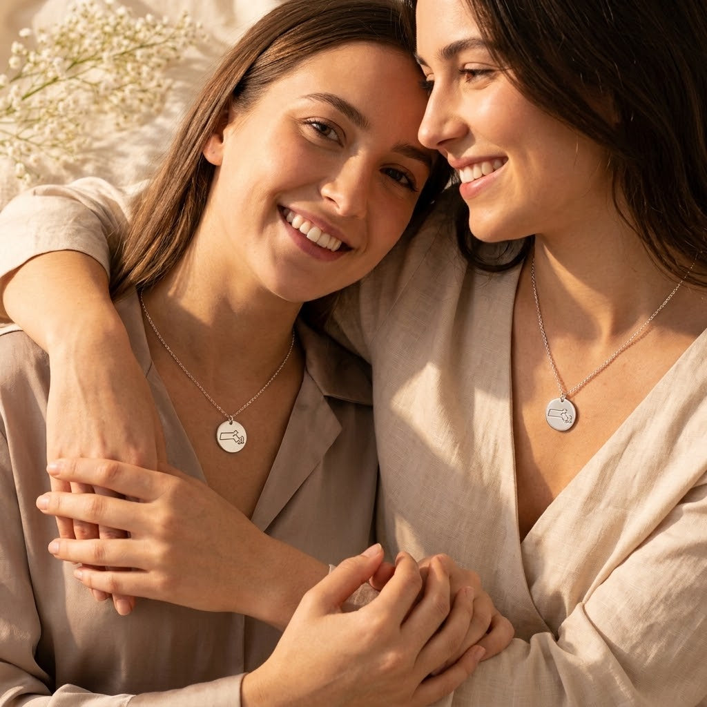 Friends wearing personalized state map necklaces as meaningful gifts