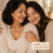 Mother and daughter wearing matching personalized state necklaces