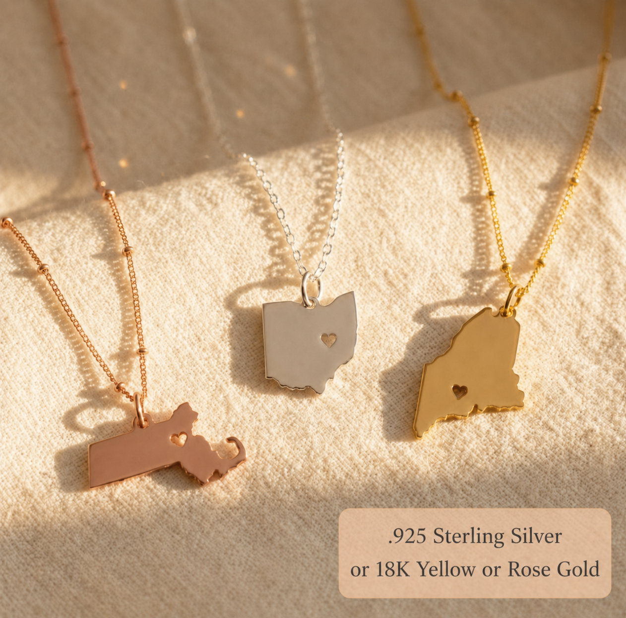 Custom state and county necklaces in three metal finishes with heart cutout