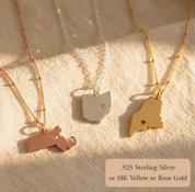 Custom state and county necklaces in three metal finishes with heart cutout