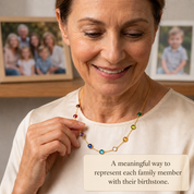 Grandmother wearing a personalized family birthstone necklace representing children and grandchildren