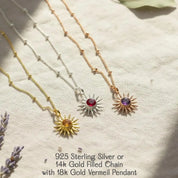 Birthstone sunburst necklace shown in sterling silver, gold filled, and rose gold filled chains