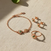 Sunburst birthstone bracelet styled with matching jewelry, featuring faceted sapphire for September and opal-inspired stone for October. Personalized mom bracelet designed as a meaningful family keepsake.