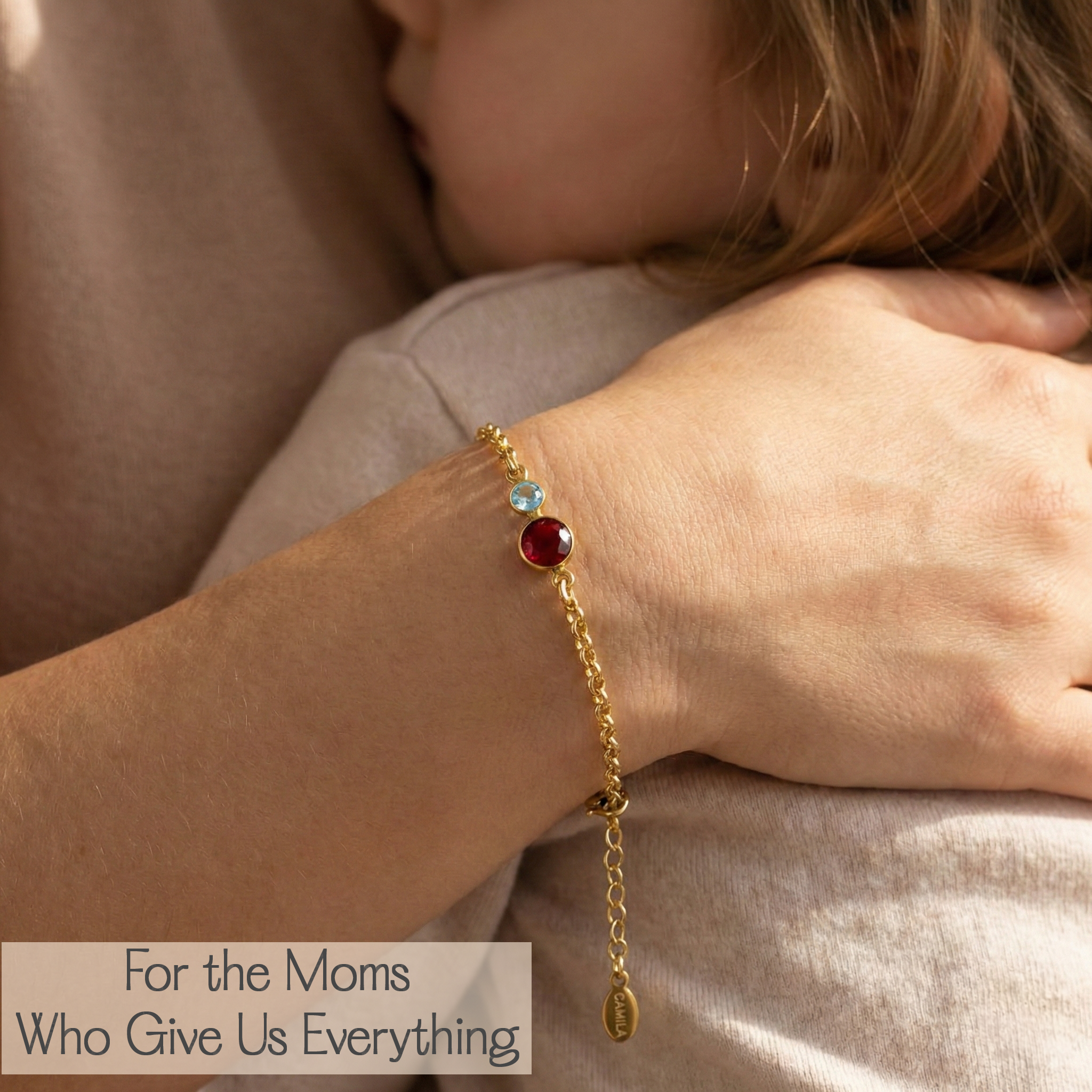Designed to celebrate motherhood, this personalized birthstone bracelet pairs a bold 5mm mom gemstone with smaller 3mm child stones in a sleek bezel setting, making it a meaningful gift for moms, grandmas, and new mothers.