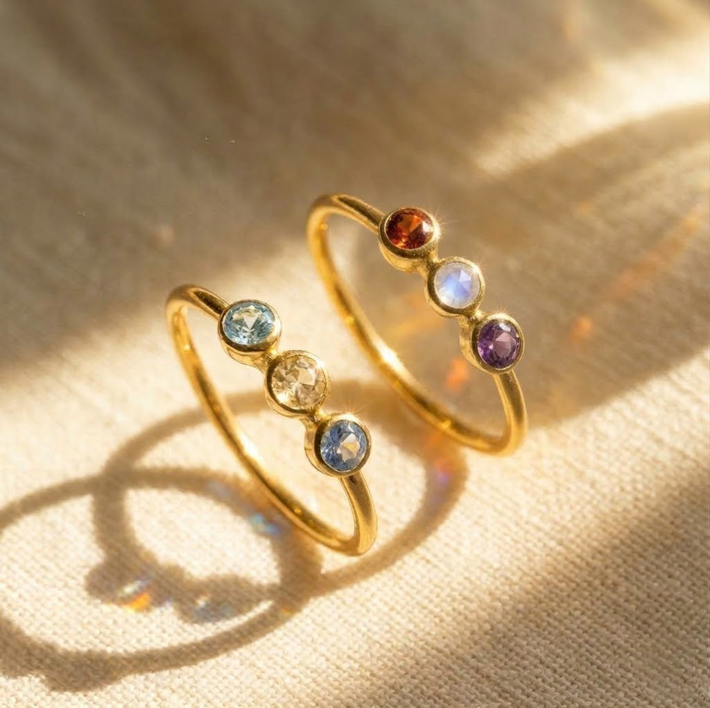 Faceted triple birthstone ring for mom in gold, dainty family birthstone ring with three round gemstones