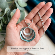 Boho triple circle pendant showing approximately 4.5 cm size
