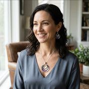 Woman wearing layered triple circle boho statement necklace
