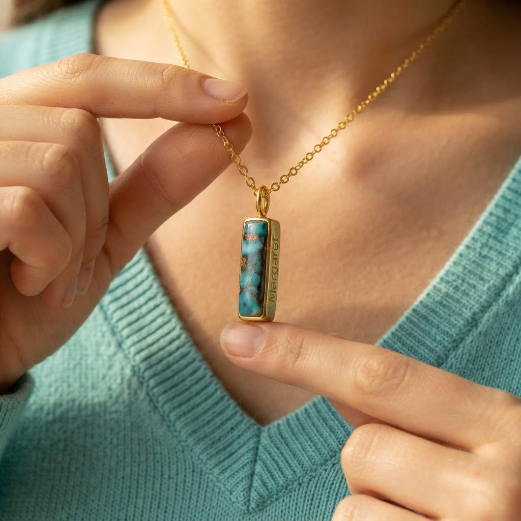 Personalized Adira bar necklace with copper turquoise stone and hidden side engraving.