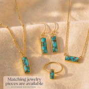 Matching turquoise gemstone jewelry set with personalized bar necklace, earrings and ring in gold.

