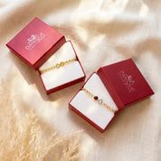 Two birthstone bracelet presented in a Danique Jewelry gift box
