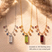 Personalized birthstone bar necklace available in sterling silver, gold, and rose gold finishes, with custom engraved charm and colorful gemstone connectors.