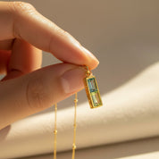 Close-up of custom vertical birthstone bar pendant – minimalist personalized birthstone necklace for mom