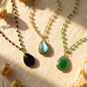 Custom teardrop birthstone necklaces with natural black green and labradorite gemstones
