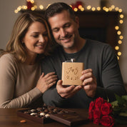 Couple holding a personalized engraved wooden flask as a sentimental gift. Custom flask gift for husbands, anniversaries, or Valentine’s Day.