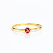 Single gold plated dainty 3mm Ruby gemstone ring. July  birthstone. On white background. 925 sterling silver, birthstone ring, stacking ring, stackable, birthstone jewelry, facet gemstone