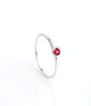 sterling silver dainty 3mm Ruby gemstone ring. July  birthstone. On white background. 925 sterling silver, birthstone ring, stacking ring, stackable, birthstone jewelry, facet gemstone