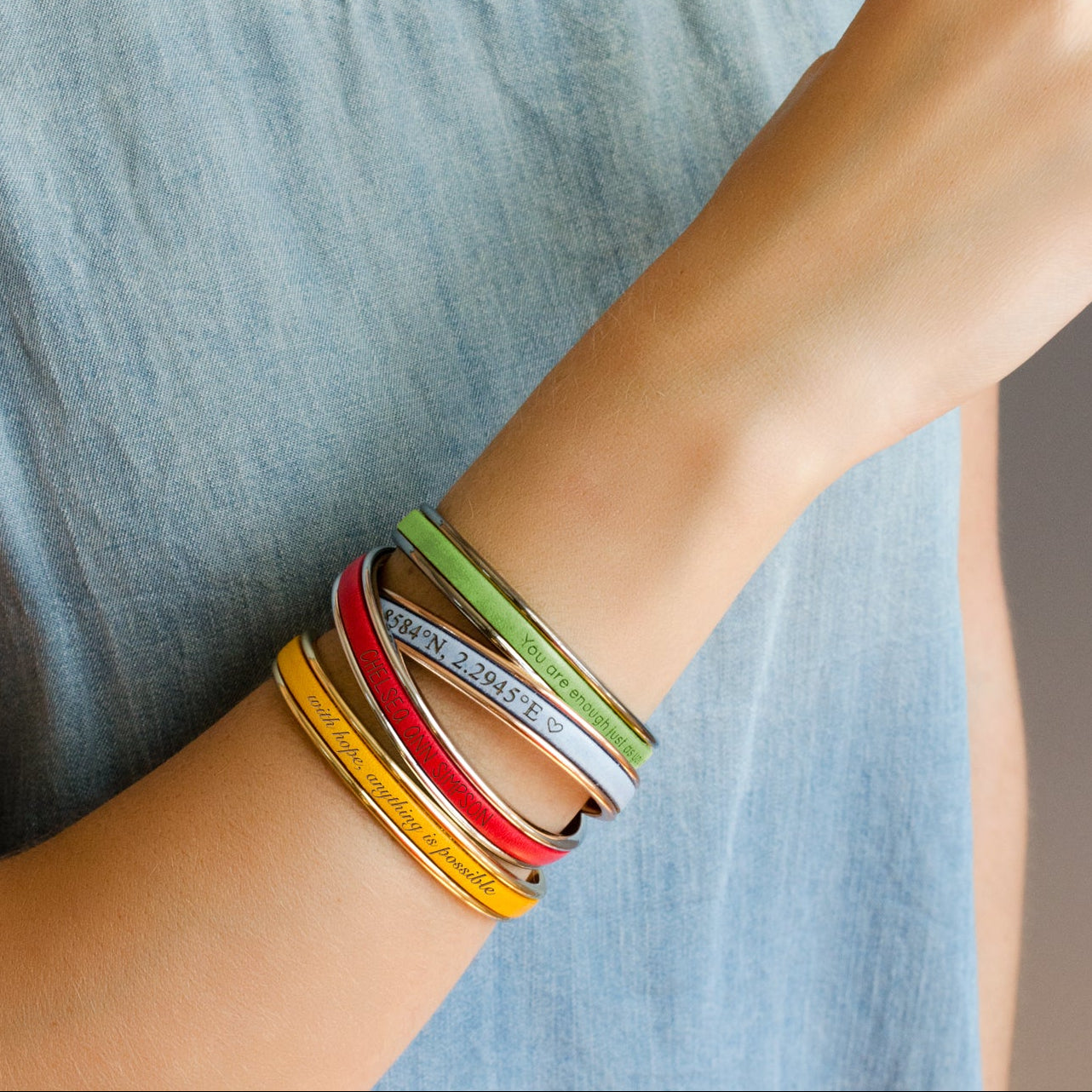 Stacked personalized leather cuff bracelets in colorful leather options