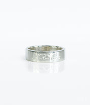 A sterling silver wide ring band engraved with a signature on the outside. Fingerprint engraved 6mm ring, custom handwriting band, sterling silver jewelry, gold wide band, rose gold thick accessory, engraved names, dates, coordinates, personal message, photo engraving, thoughtful gift, cherished keepsake, timeless design, US sizes 4-13, men's fashion. Gift for her, gift for him, memorial gift, commemorative gift, gift for fiance, gift for husband, gift for wife, gift for girlfriend, gift for boyfriend,