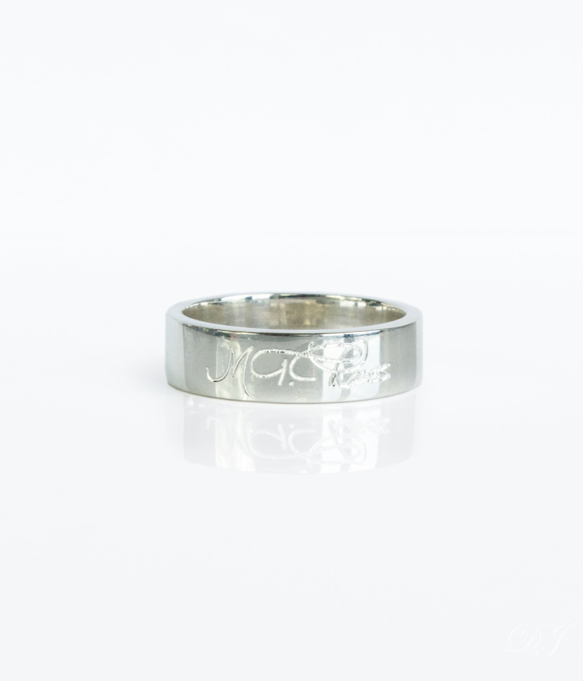 A sterling silver wide ring band engraved with a signature on the outside. Fingerprint engraved 6mm ring, custom handwriting band, sterling silver jewelry, gold wide band, rose gold thick accessory, engraved names, dates, coordinates, personal message, photo engraving, thoughtful gift, cherished keepsake, timeless design, US sizes 4-13, men's fashion. Gift for her, gift for him, memorial gift, commemorative gift, gift for fiance, gift for husband, gift for wife, gift for girlfriend, gift for boyfriend,