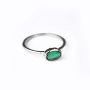 sterling silver green tourmaline ring shown on white background. stackable! Stacking rings, bezel set, small oval, tiny oval, dainty oval, birthstone rings, sterling silver stamp, birthstone ring, birthstone jewelry, green gemstone, green birthstone, october birthstone, october gemstone