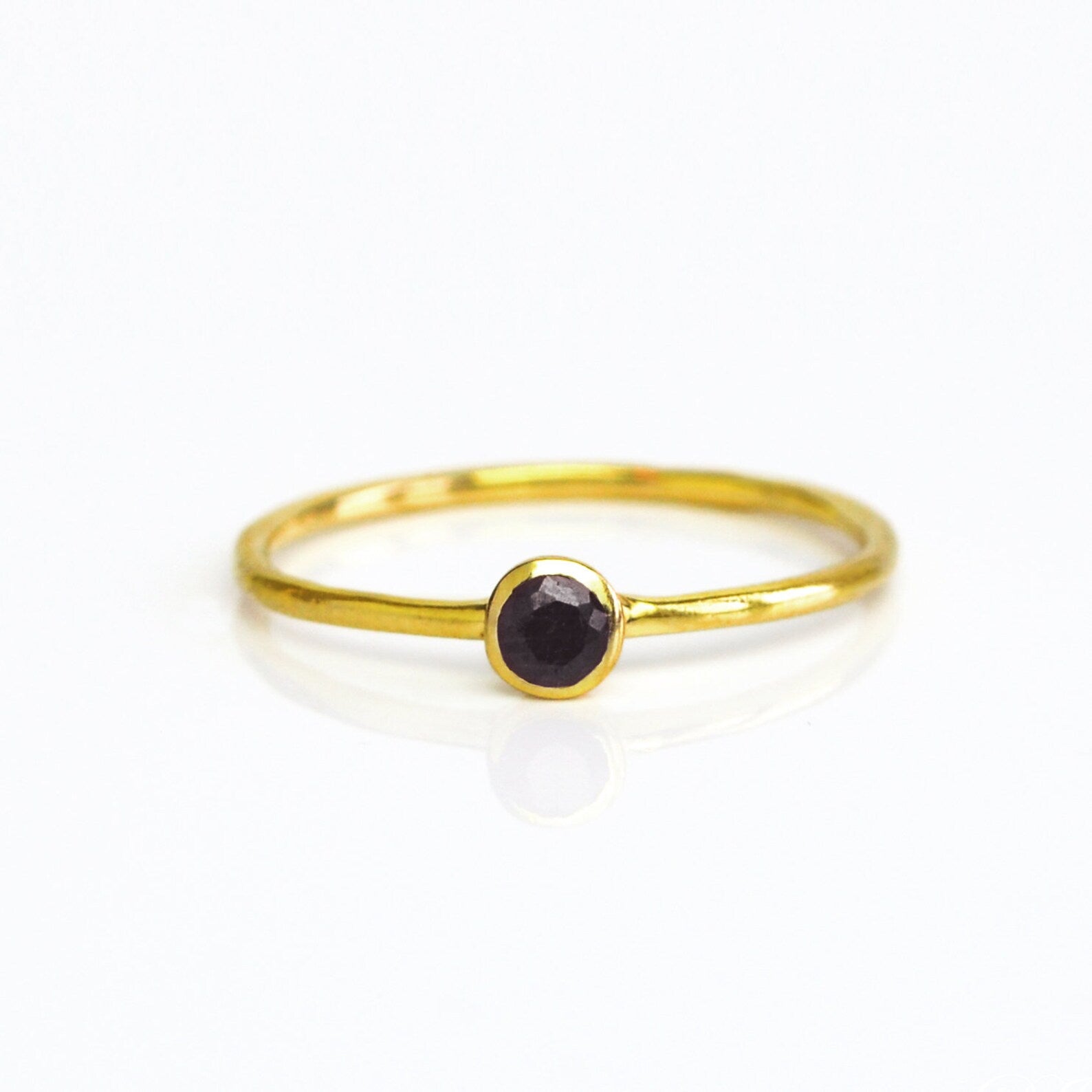 Single gold plated dainty 3mm black onyx gemstone ring. december  birthstone. On white background. 925 sterling silver, birthstone ring, stacking ring, stackable, birthstone jewelry, facet gemstone