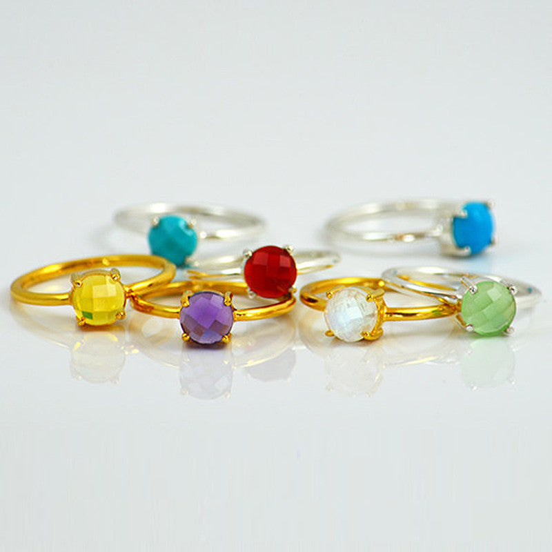 Assorted sterling silver and gold plated stackable prong set round ring. Birthstone jewelry, birthstone ring, stacking rings, ring stack, gemstone ring, gemstone rings. Gemstones shown are turquoise, citrine, purple amethyst, garnet, lear quartz and light green amethyst. 