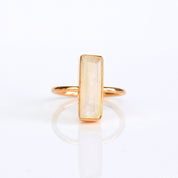 Moonstone gemstone ring, June birthstone accessory, natural Moonstone with feldspar, shimmering color display, thin vertical design, Adira Series ring, bezel-set Moonstone jewelry, elegant Moonstone bar ring, unique June ring, fashion-forward Moonstone