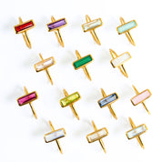 Shop the tiny adira bar ring collection! Gold filled rings shown from top to bottom garnet, purple amethyst, green amethyst, qua chalcedony, clear, green onyx, moonstone, ruby, peridot, kyanite, pink chalcedony, opalite, citrine, blue quartz